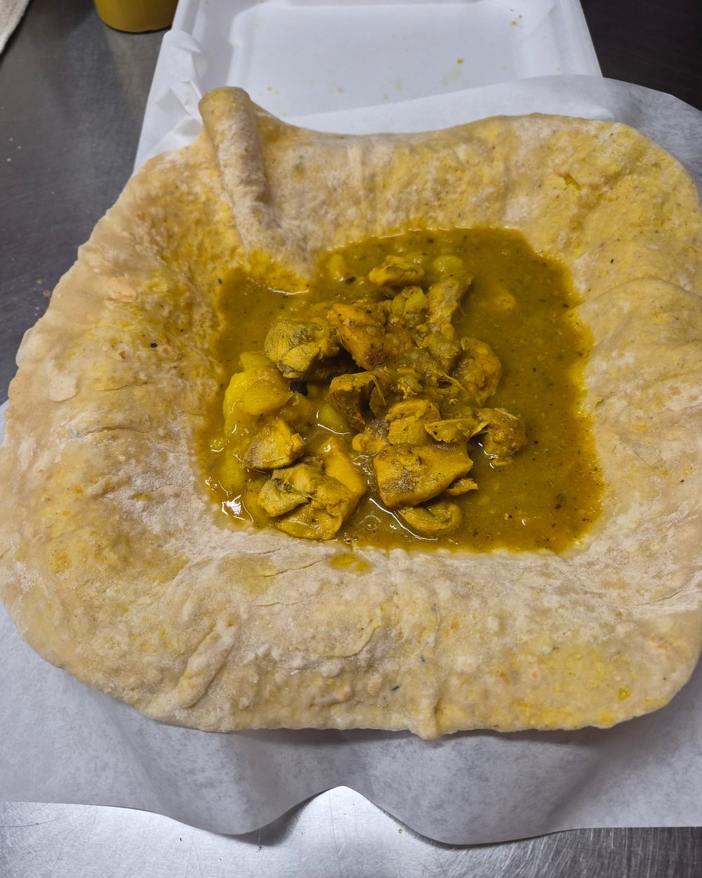 Curry chicken dhalpuri at Tara's Roti Shop